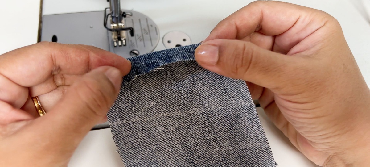 fabric strap, top edge turned to the wrong side of fabric
