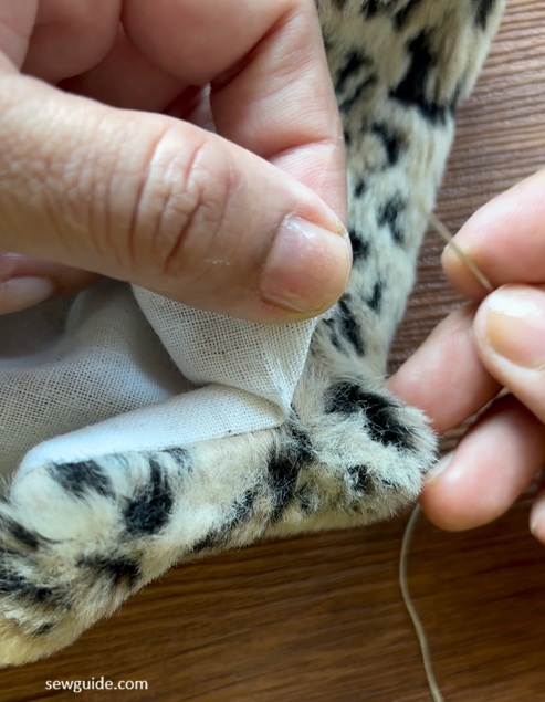 hand stitch the edges