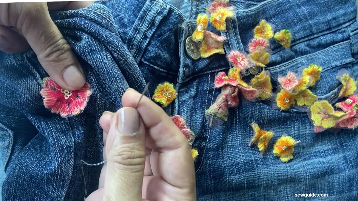stitching floral applique to jeans