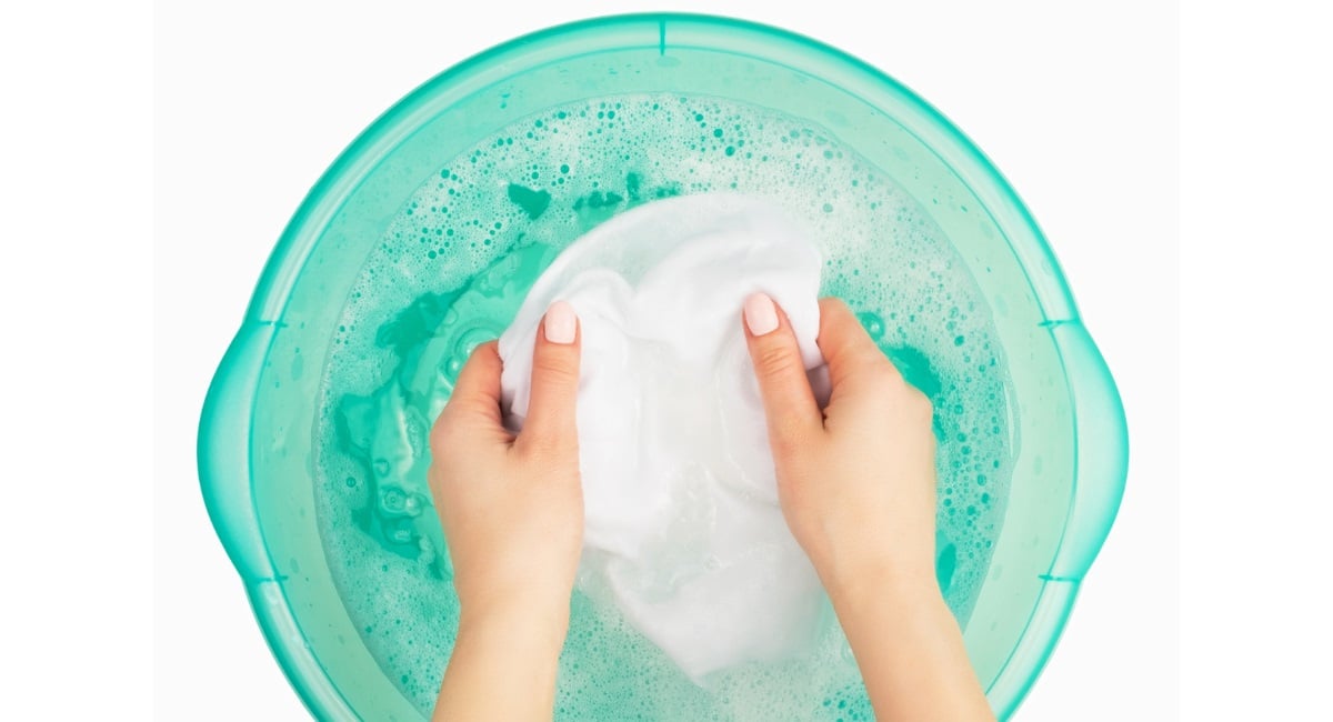 Hand washing fabric before tie-dyeing
