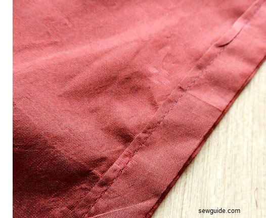 The hem of the kimono cardigan finished