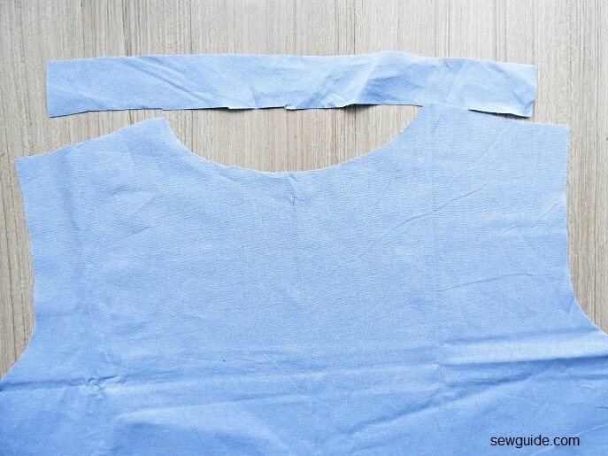Bind the back neckline