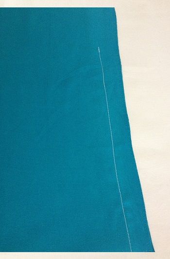 Sew the fabric edges together making a tube. Remember to stop stitching atleast 3 1/2 inch from one edge.Â