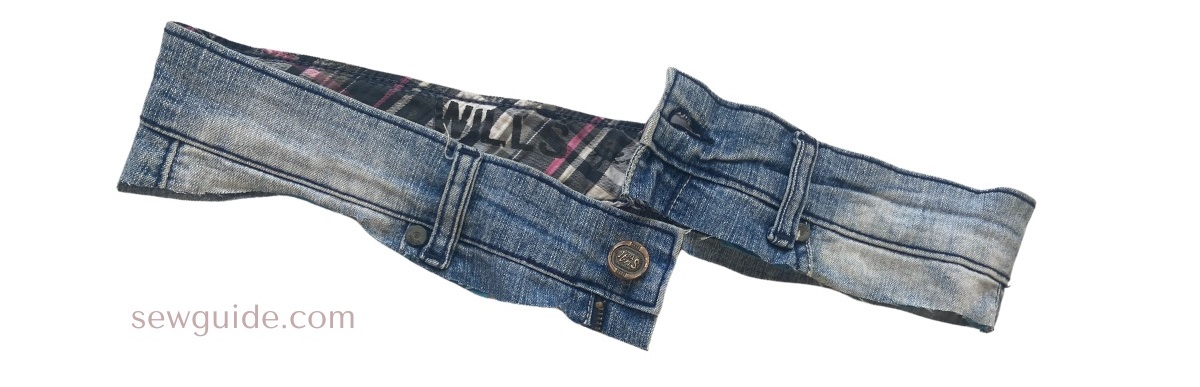 waistband of the jeans