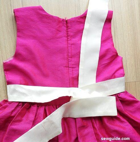 tie a bow with sash