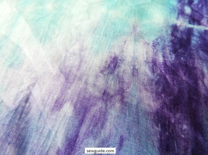 Tie-dye patterns created on previously dyed fabric